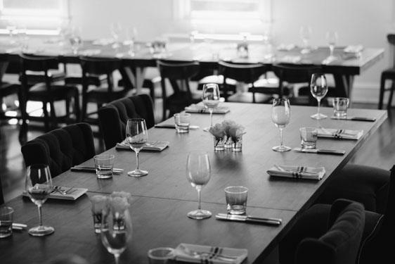 Long wood table with cutlery at the Aberdeen Tavern