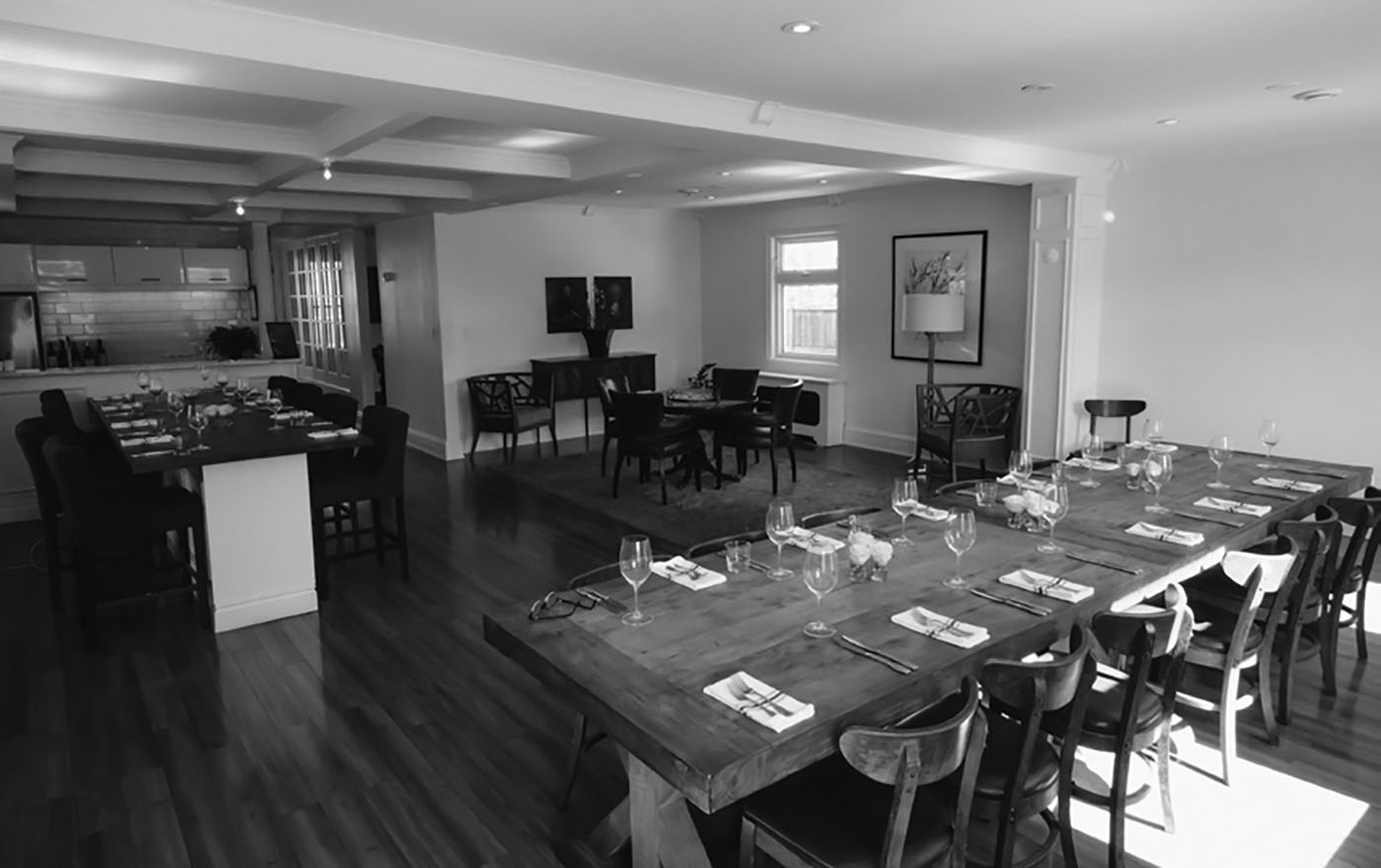 Long wood table with cutlery at the Apartment