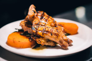 Plate of Grilled Cornish Hen with squash